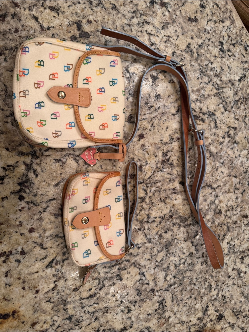 2 Dooney & Bourke Crossbody Multicolor Logo Print + additional Dooney wristlet